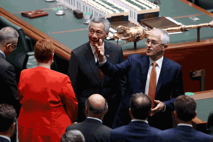 Malcolm Turnbull beckons Tony Abbott to chat with the Singaporean PM.