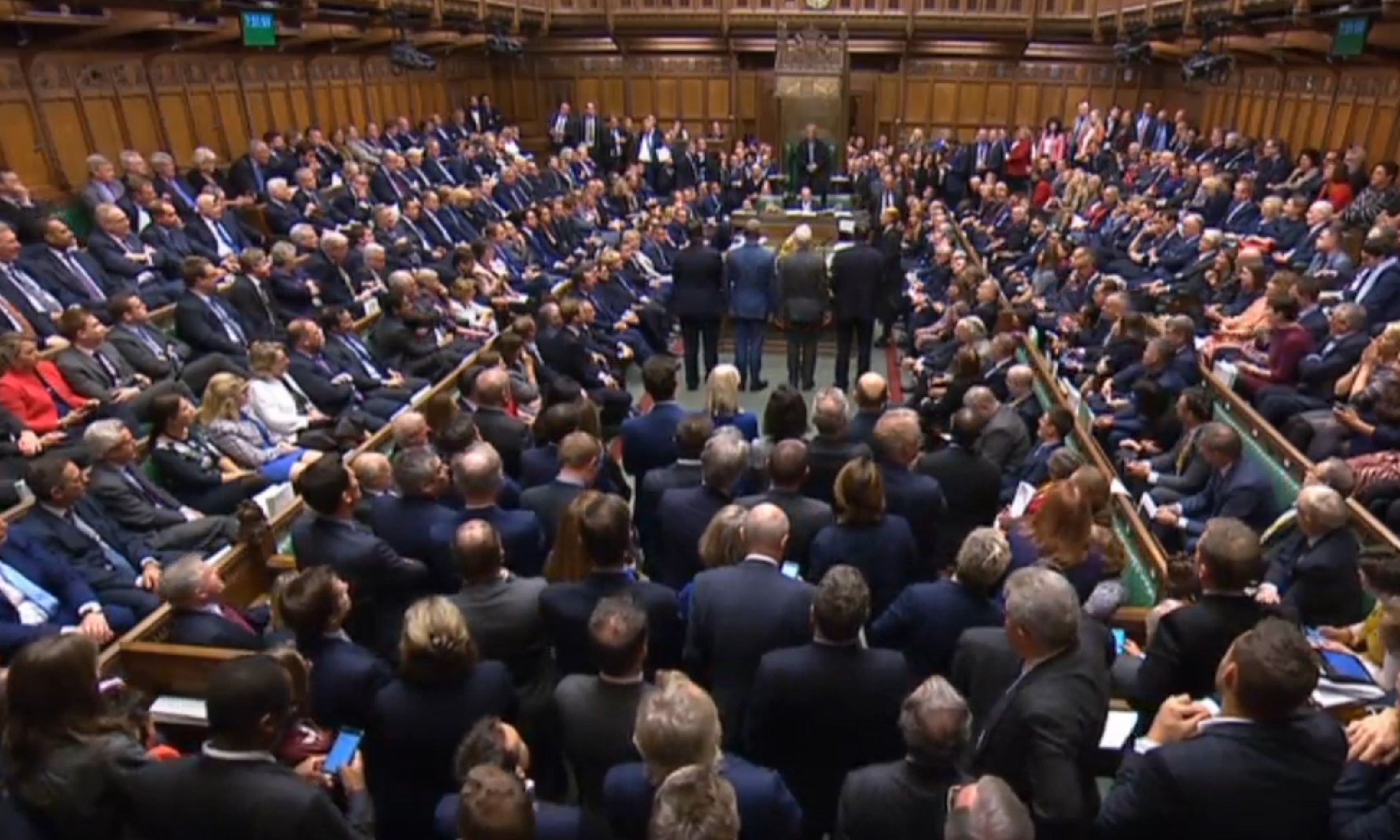 MPs listen for the outcome of a Brexit bill vote in the House of Commons