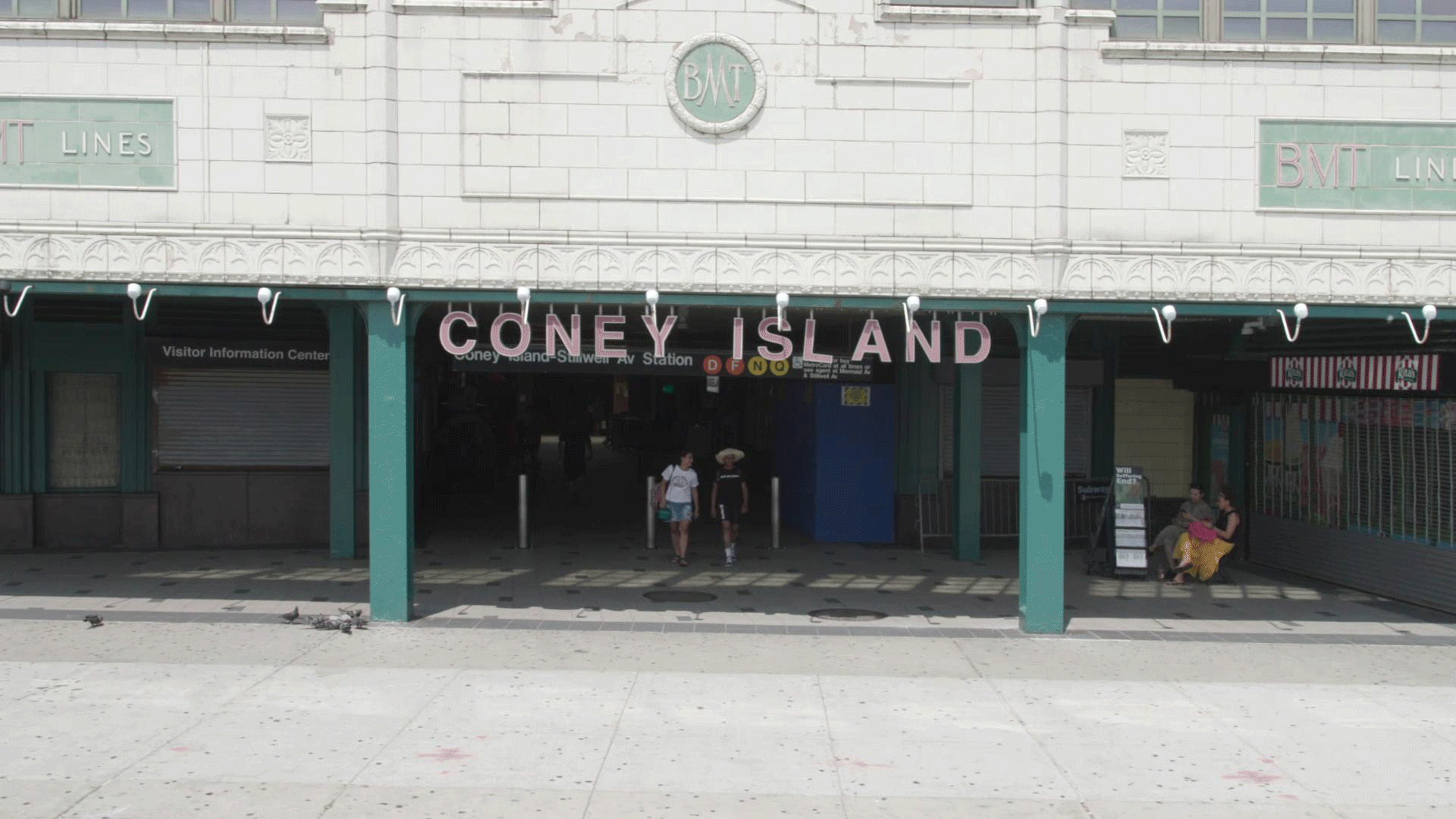 An animated image of the Coney Island boardwalk slowly flooding with water from now until 2100