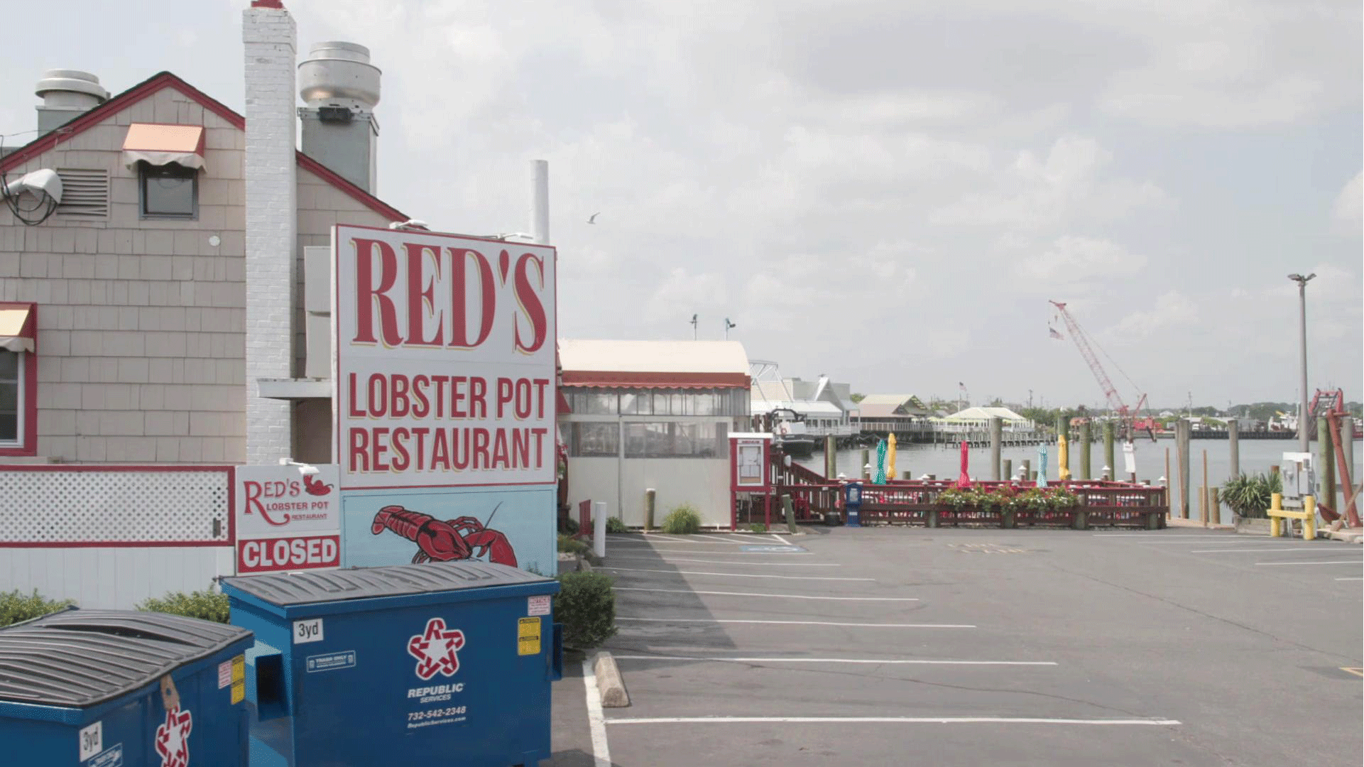 A parking lot in a coastal town for Red’s Lobster Pot restaurant gets slowly flooded from now until 2100.