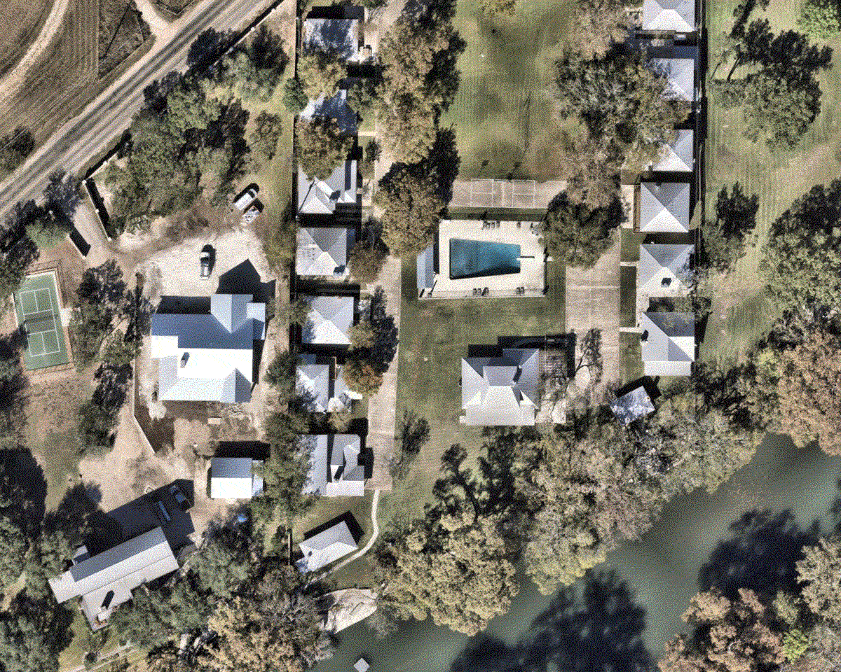 Rooftop views of houses, trees and river