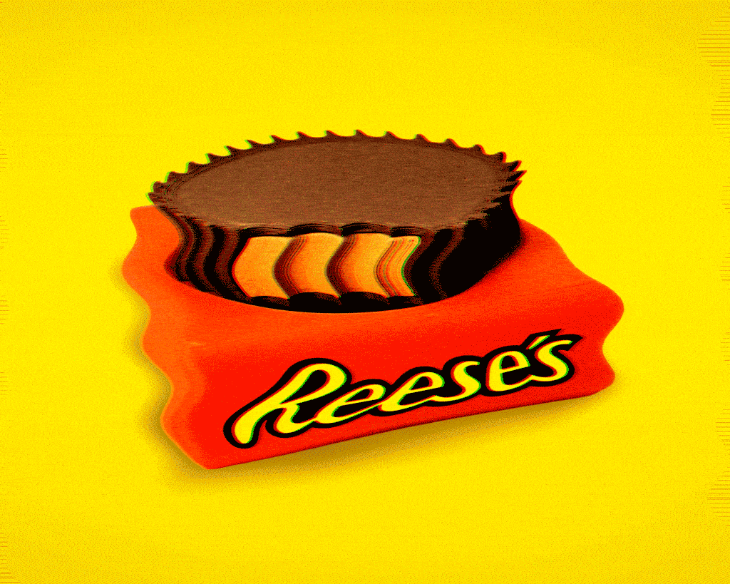 Wavy peanut butter cup resting on a Reese's wrapper