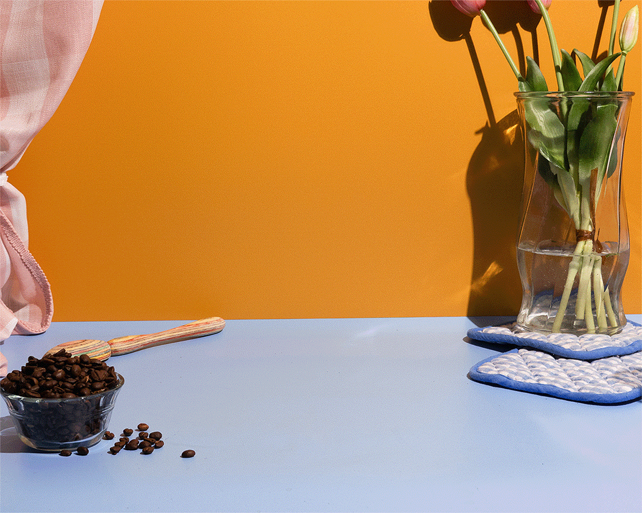 A person making a cup of coffee with an aeropress